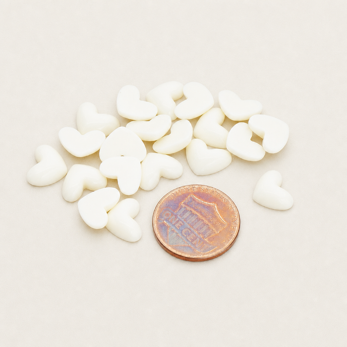Tiny heart flat back cabochons in various colors