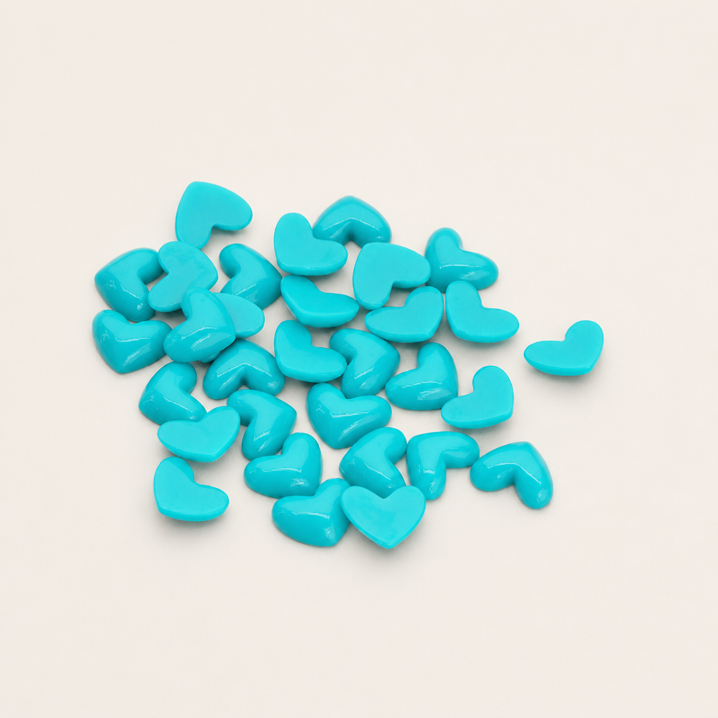 Tiny heart flat back cabochons in various colors