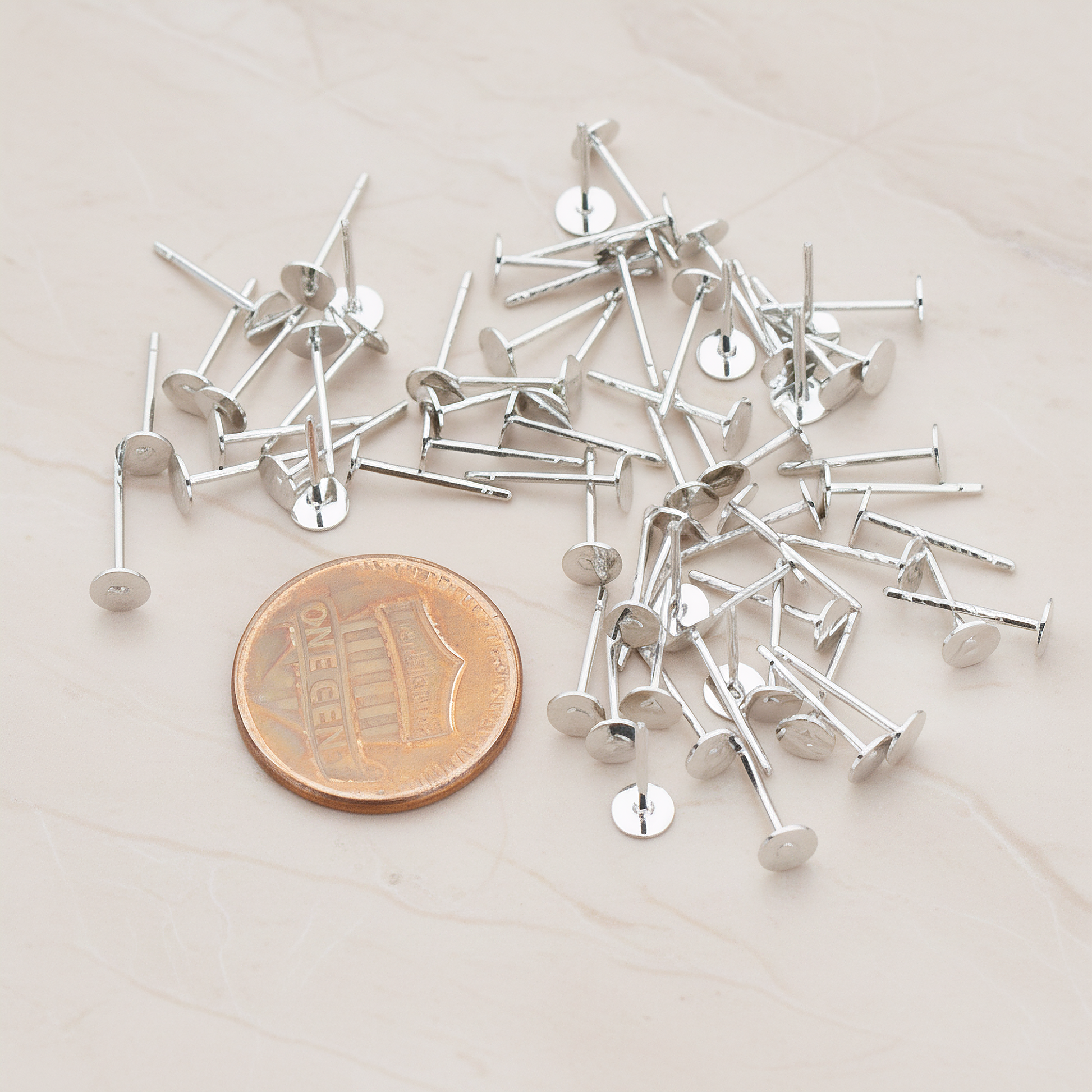 Round Pad with Titanium Ear Post, 12 Pc - detail view 1 (ER.872)