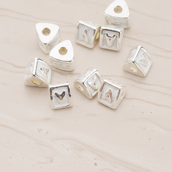 Triangle Cube Initial Metal Bead, 2 Pc on warm marble background (PD.1136)