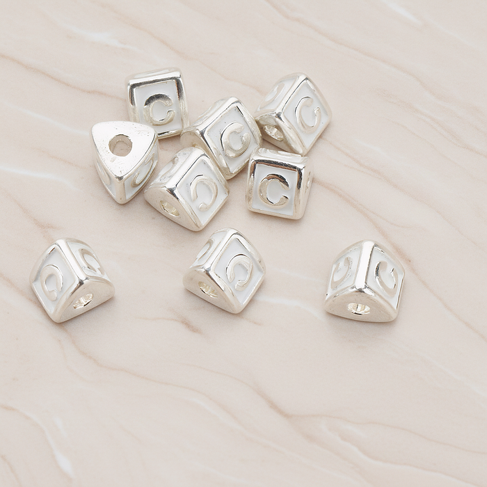 Triangle Cube Initial Metal Bead, 2 Pc on warm marble background (PD.1136)