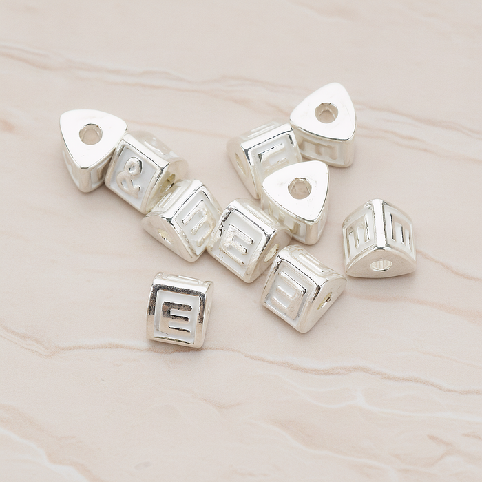 Triangle Cube Initial Metal Bead, 2 Pc on warm marble background (PD.1136)
