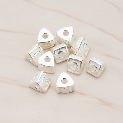 Triangle Cube Initial Metal Bead, 2 Pc on warm marble background (PD.1136)