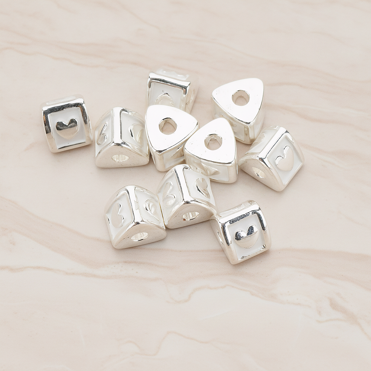 Triangle Cube Initial Metal Bead, 2 Pc on warm marble background (PD.1136)