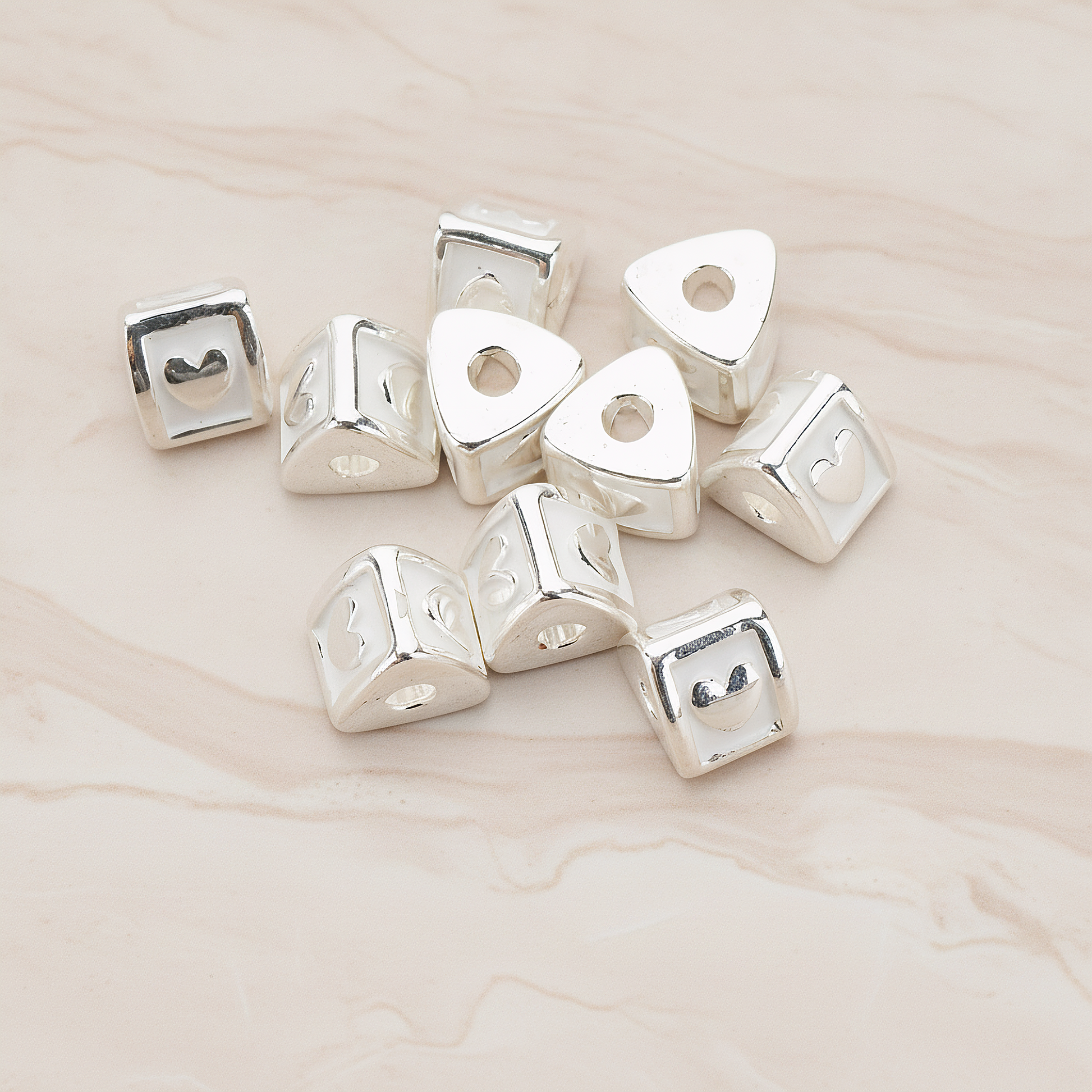 Triangle Cube Initial Metal Bead, 2 Pc on warm marble background (PD.1136)