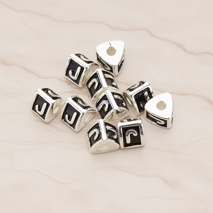 Triangle Cube Initial Metal Bead, 2 Pc on warm marble background (PD.1136)