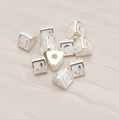 Triangle Cube Initial Metal Bead, 2 Pc on warm marble background (PD.1136)