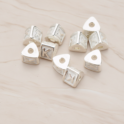 Triangle Cube Initial Metal Bead, 2 Pc on warm marble background (PD.1136)