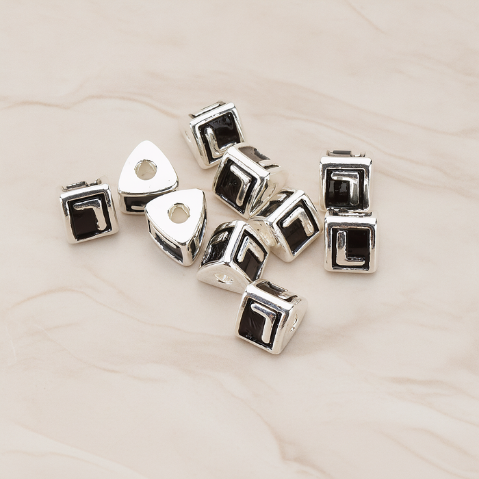 Triangle Cube Initial Metal Bead, 2 Pc on warm marble background (PD.1136)