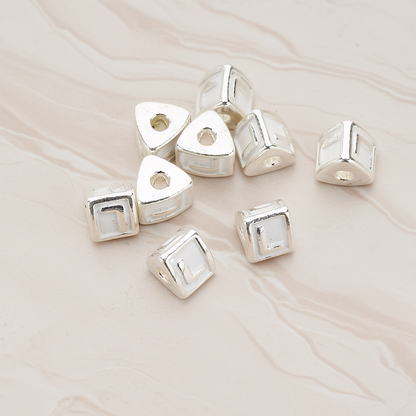 Triangle Cube Initial Metal Bead, 2 Pc on warm marble background (PD.1136)
