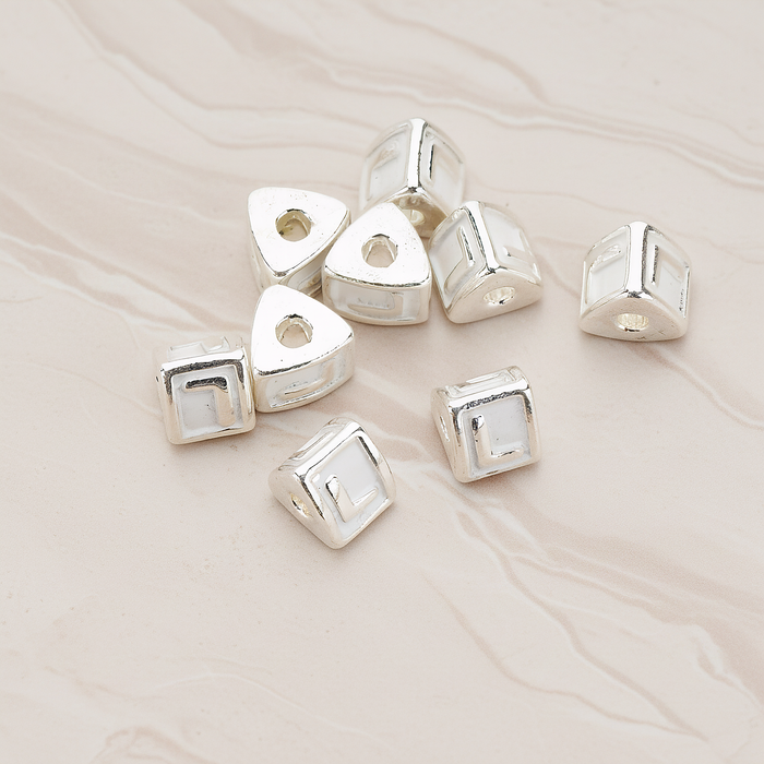 Triangle Cube Initial Metal Bead, 2 Pc on warm marble background (PD.1136)