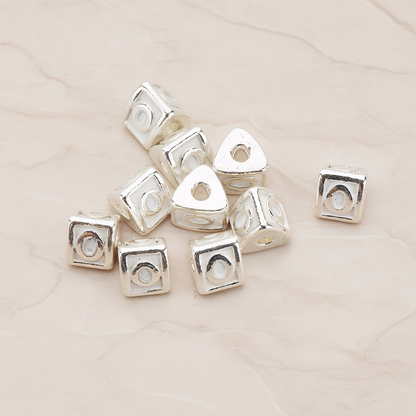 Triangle Cube Initial Metal Bead, 2 Pc on warm marble background (PD.1136)