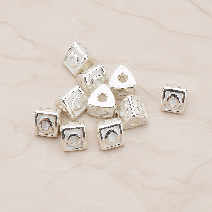 Triangle Cube Initial Metal Bead, 2 Pc on warm marble background (PD.1136)