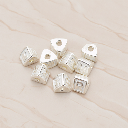 Triangle Cube Initial Metal Bead, 2 Pc on warm marble background (PD.1136)
