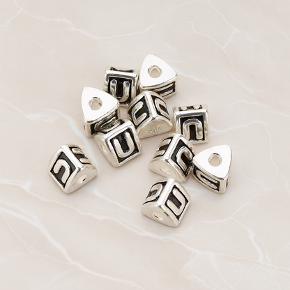 Triangle Cube Initial Metal Bead, 2 Pc on warm marble background (PD.1136)