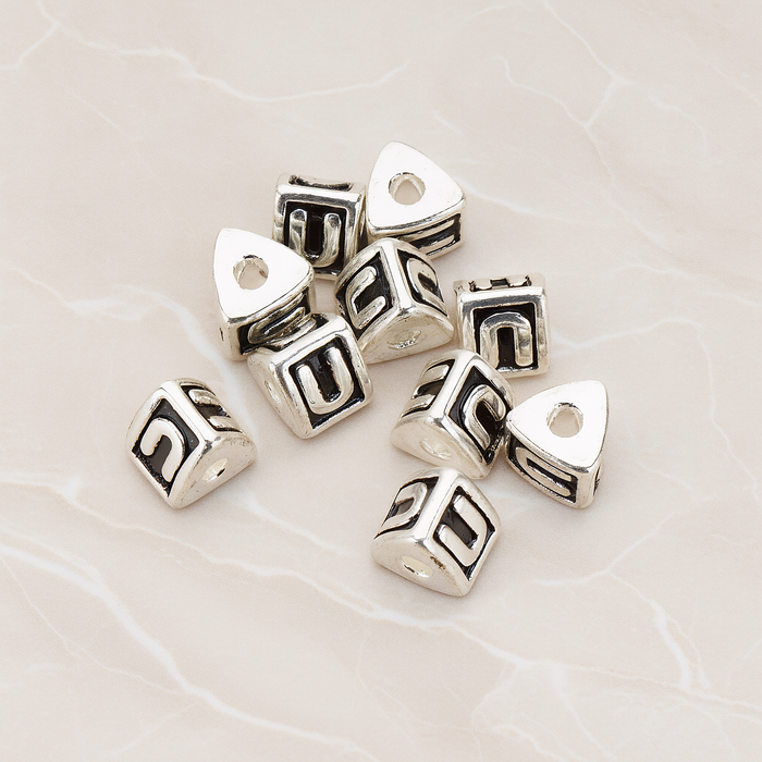 Triangle Cube Initial Metal Bead, 2 Pc on warm marble background (PD.1136)