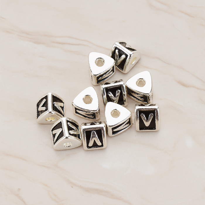 Triangle Cube Initial Metal Bead, 2 Pc on warm marble background (PD.1136)