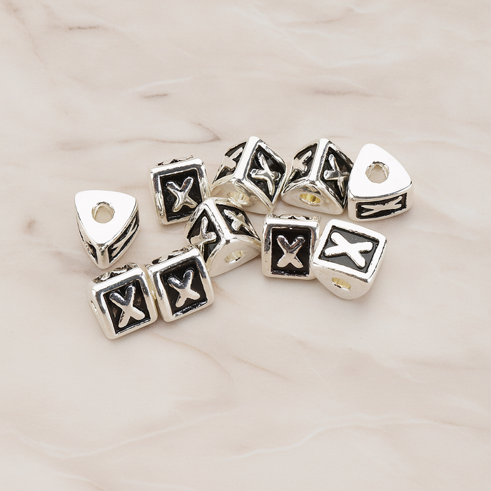 Triangle Cube Initial Metal Bead, 2 Pc on warm marble background (PD.1136)