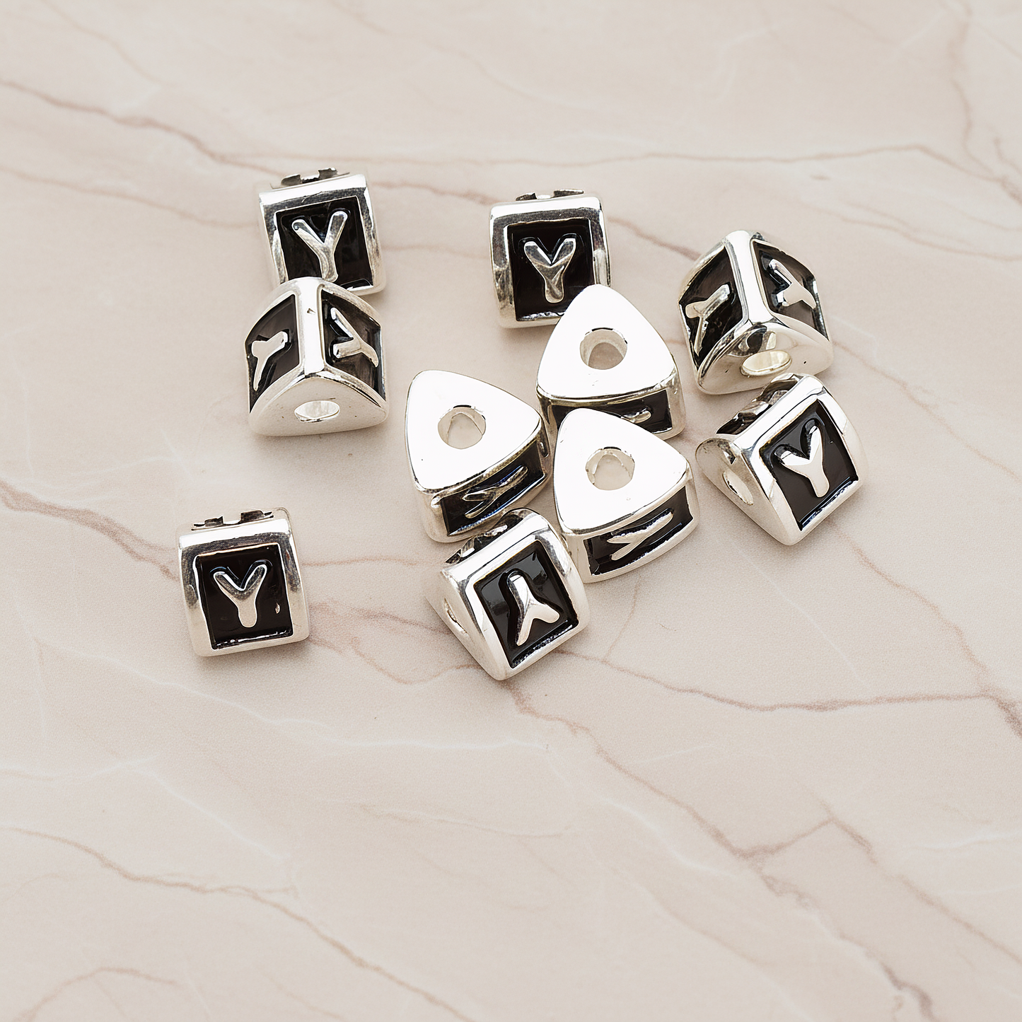 Triangle Cube Initial Metal Bead, 2 Pc on warm marble background (PD.1136)