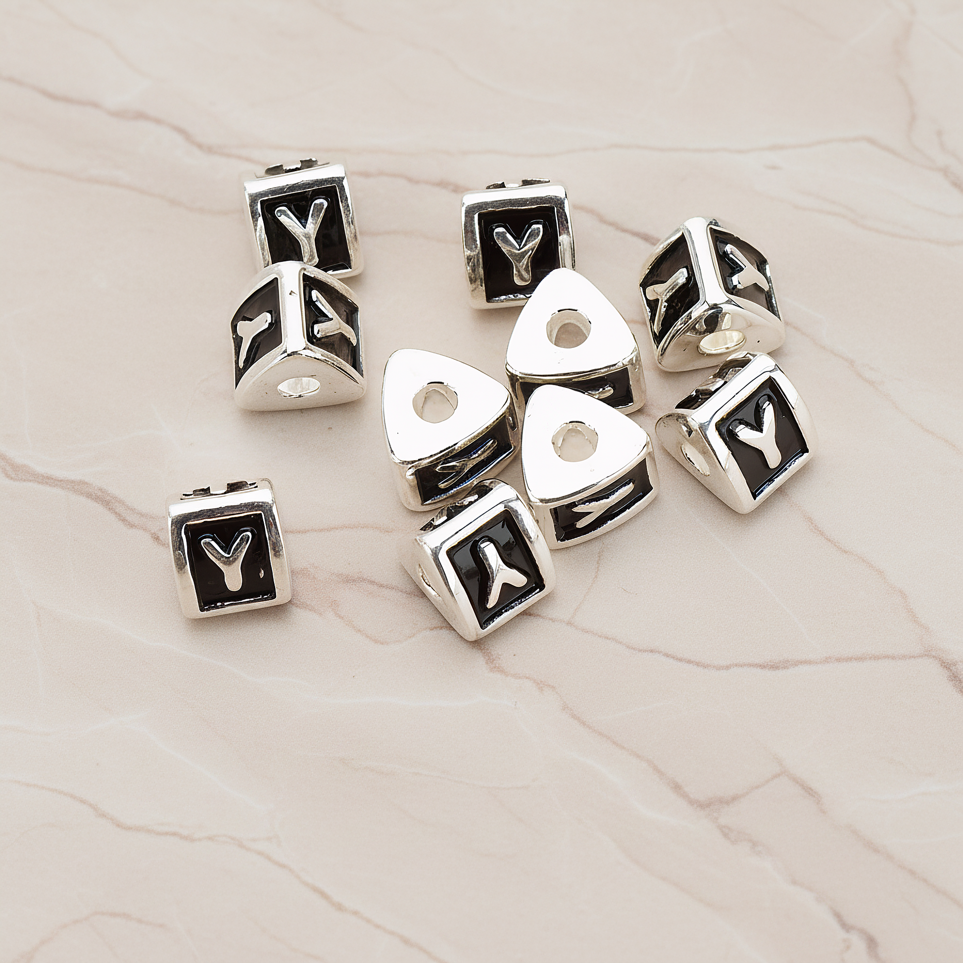 Triangle Cube Initial Metal Bead, 2 Pc on warm marble background (PD.1136)