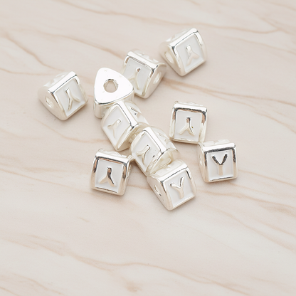 Triangle Cube Initial Metal Bead, 2 Pc on warm marble background (PD.1136)