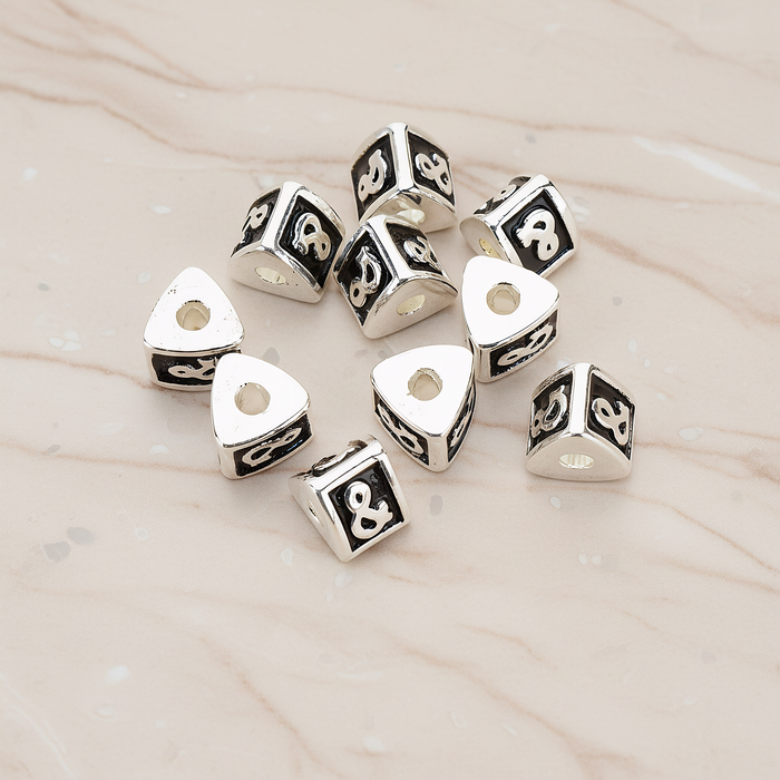 Triangle Cube Initial Metal Bead, 2 Pc on warm marble background (PD.1136)