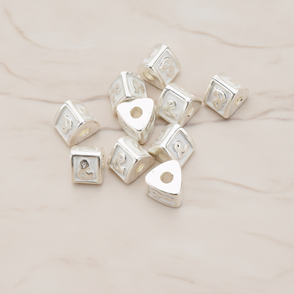 Triangle Cube Initial Metal Bead, 2 Pc on warm marble background (PD.1136)