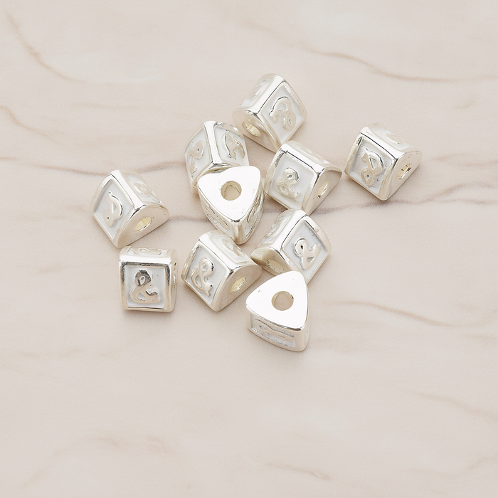 Triangle Cube Initial Metal Bead, 2 Pc on warm marble background (PD.1136)