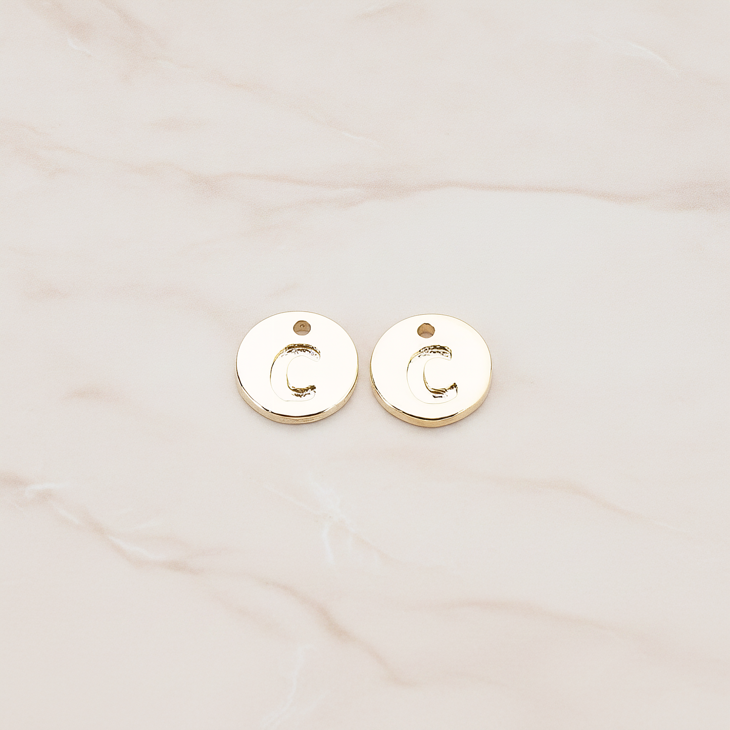 Round Disk Initial Pendant, 2 Pc on warm marble background (PD.219)