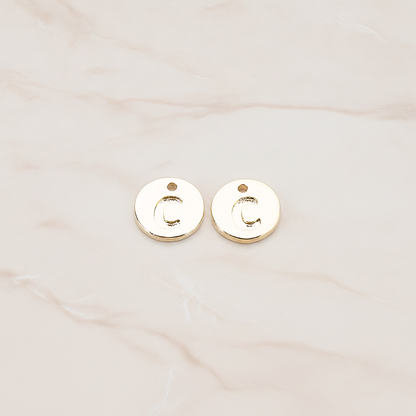 Round Disk Initial Pendant, 2 Pc on warm marble background (PD.219)