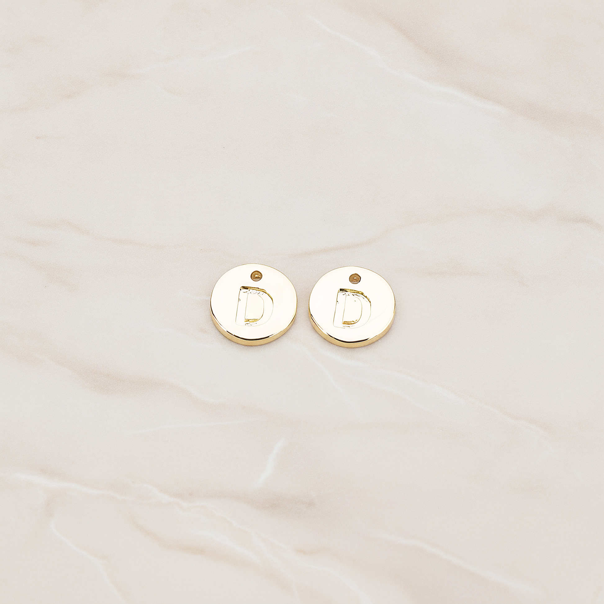 Round Disk Initial Pendant, 2 Pc on warm marble background (PD.219)