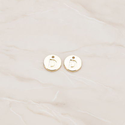 Round Disk Initial Pendant, 2 Pc on warm marble background (PD.219)