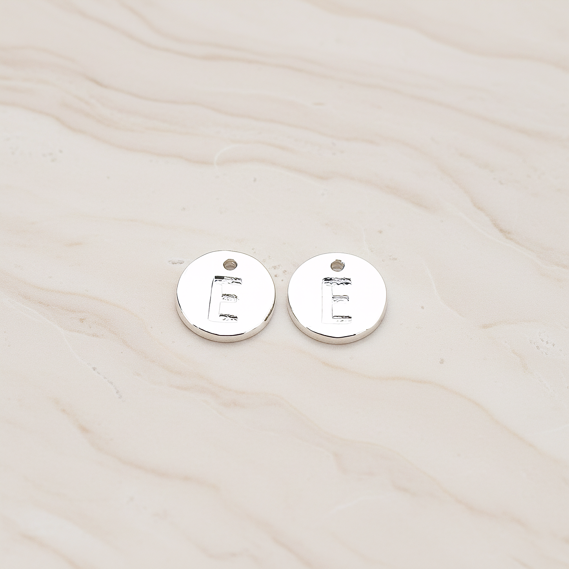 Round Disk Initial Pendant, 2 Pc on warm marble background (PD.219)