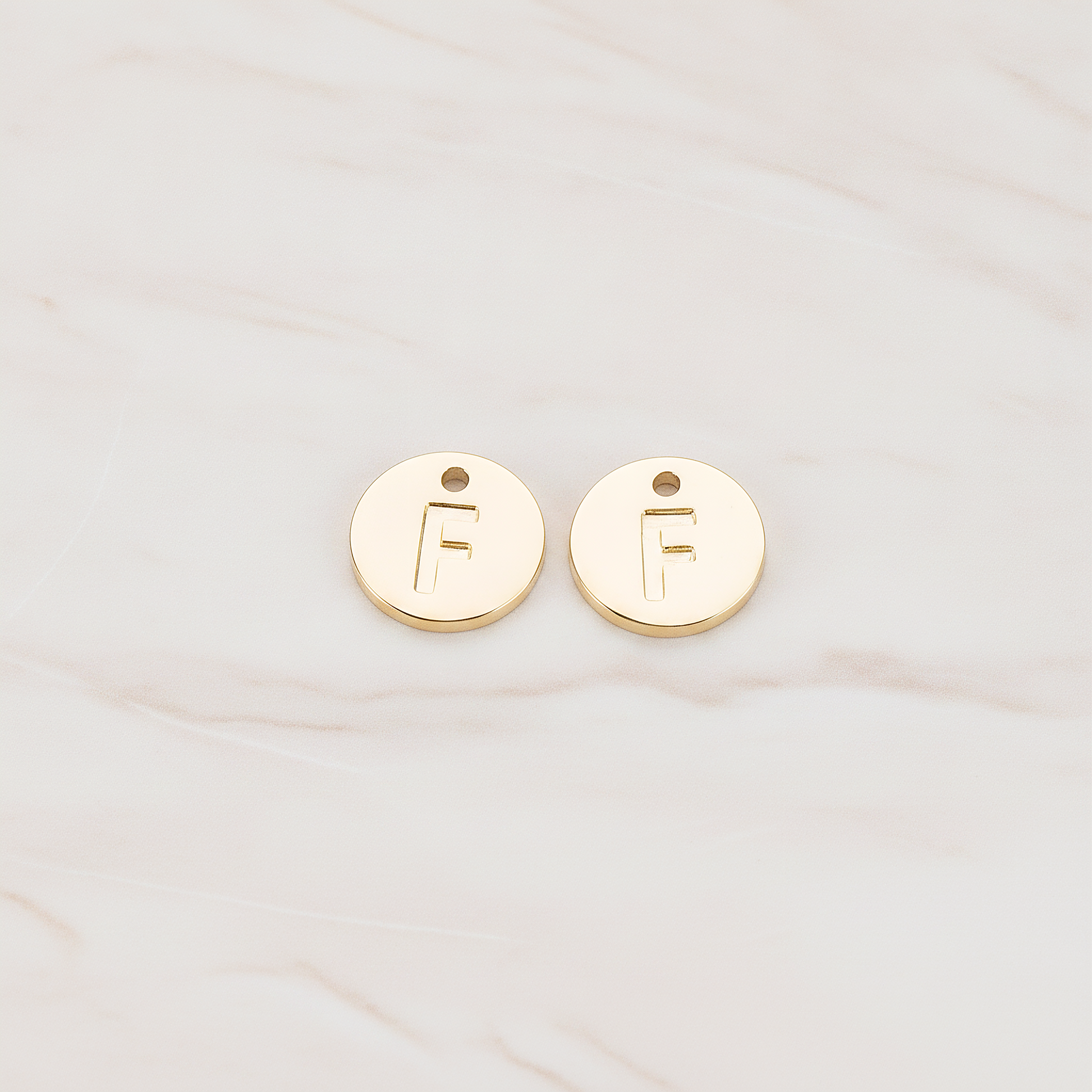 Round Disk Initial Pendant, 2 Pc on warm marble background (PD.219)
