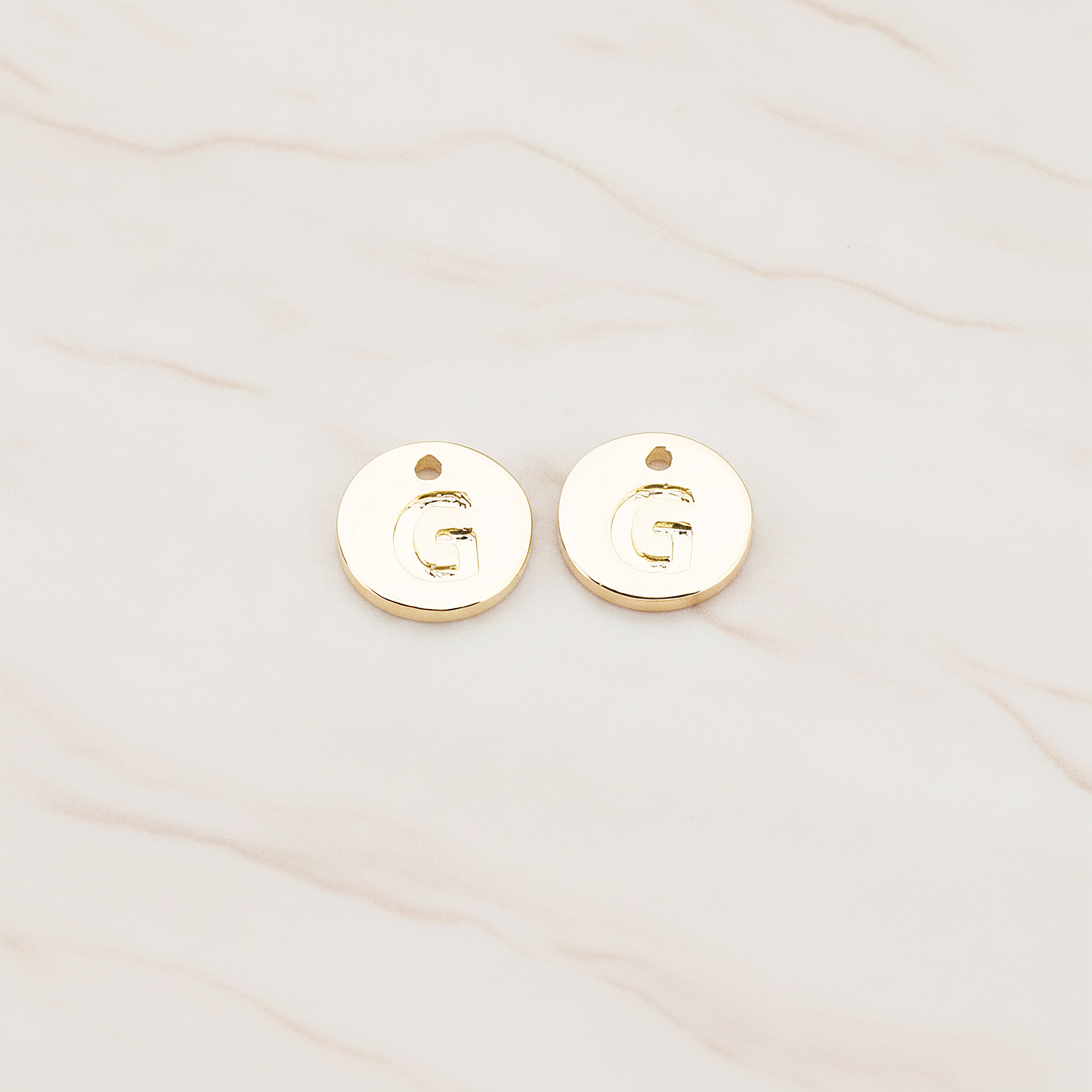 Round Disk Initial Pendant, 2 Pc on warm marble background (PD.219)