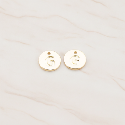 Round Disk Initial Pendant, 2 Pc on warm marble background (PD.219)