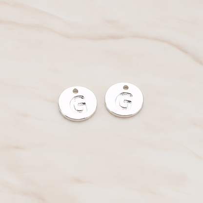 Round Disk Initial Pendant, 2 Pc on warm marble background (PD.219)