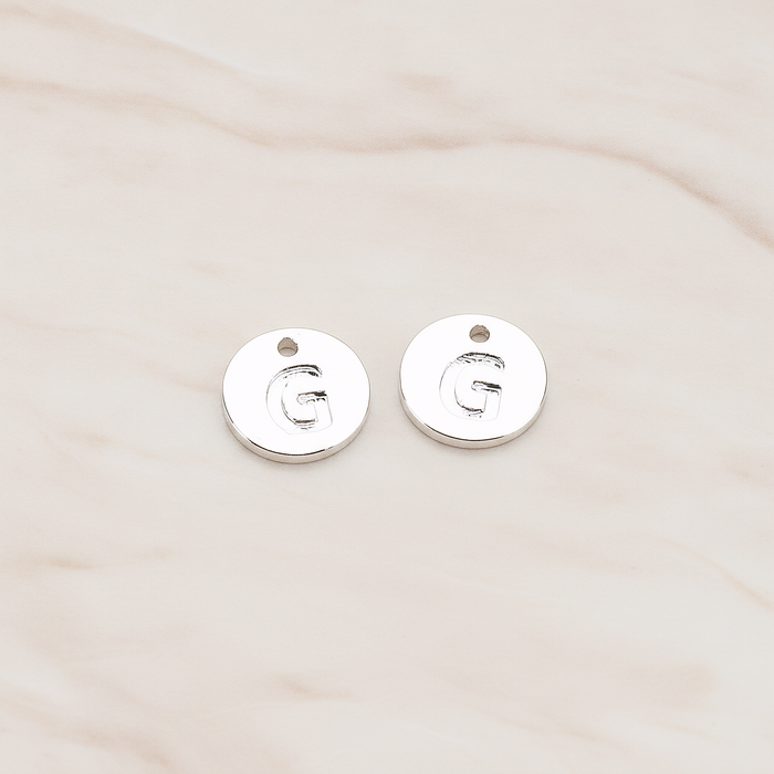 Round Disk Initial Pendant, 2 Pc on warm marble background (PD.219)