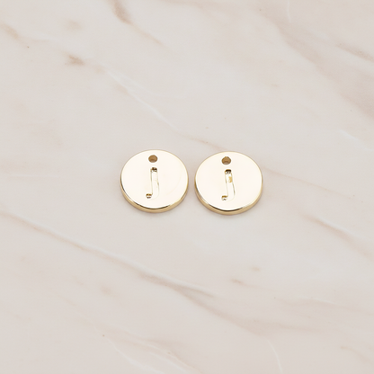 Round Disk Initial Pendant, 2 Pc on warm marble background (PD.219)