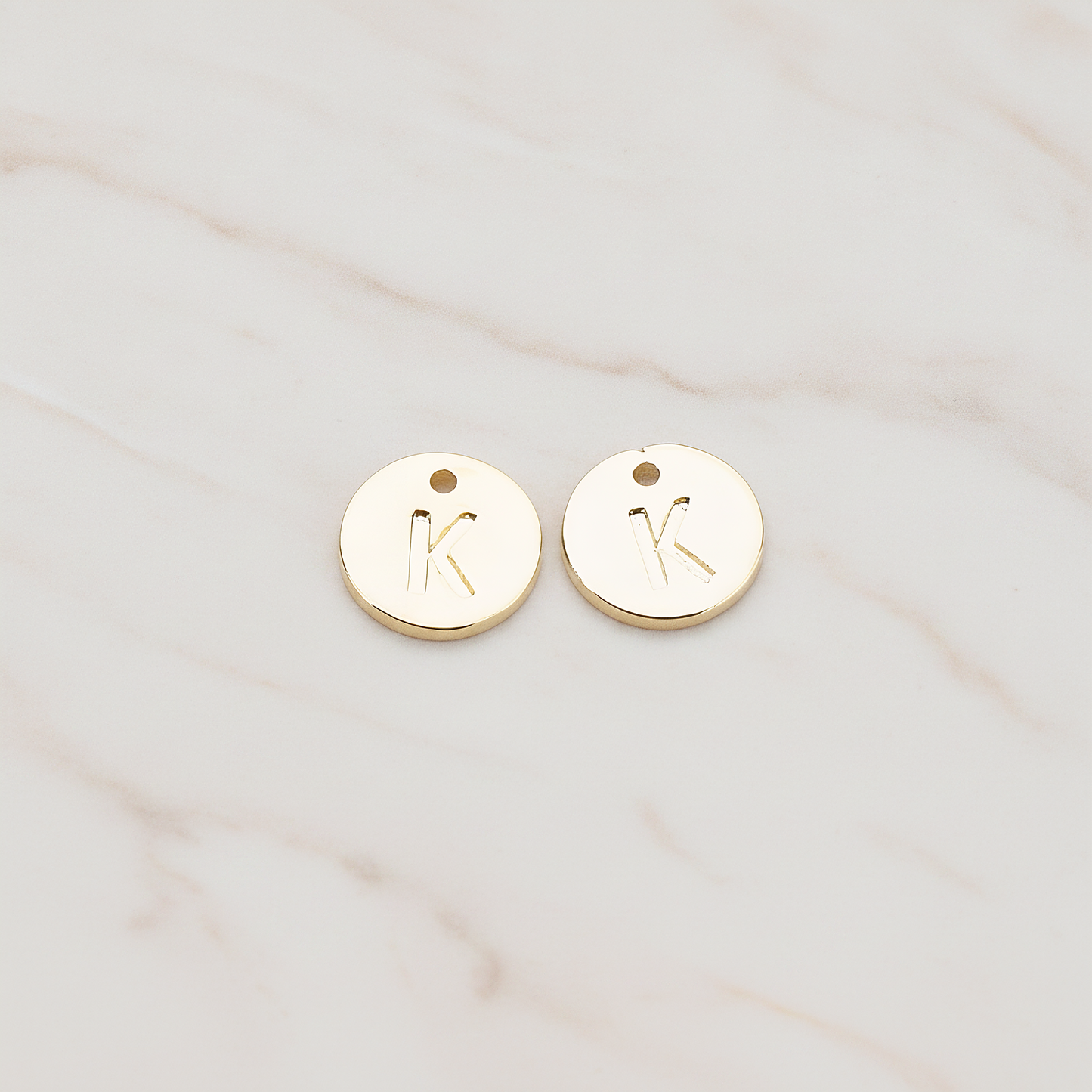 Round Disk Initial Pendant, 2 Pc on warm marble background (PD.219)