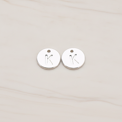 Round Disk Initial Pendant, 2 Pc on warm marble background (PD.219)