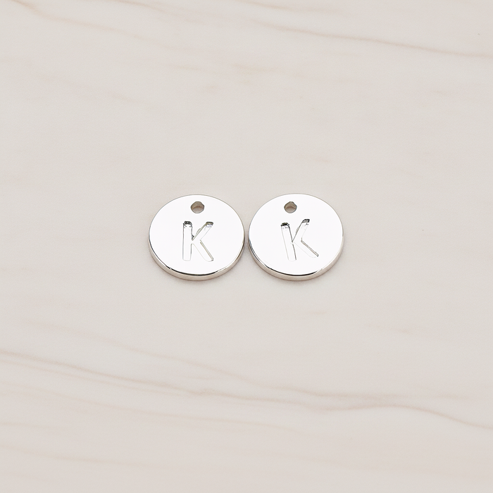 Round Disk Initial Pendant, 2 Pc on warm marble background (PD.219)