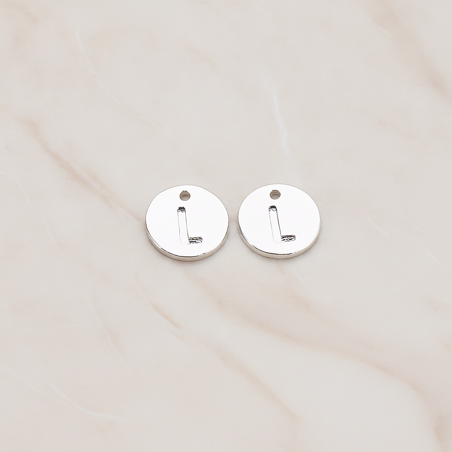 Round Disk Initial Pendant, 2 Pc on warm marble background (PD.219)