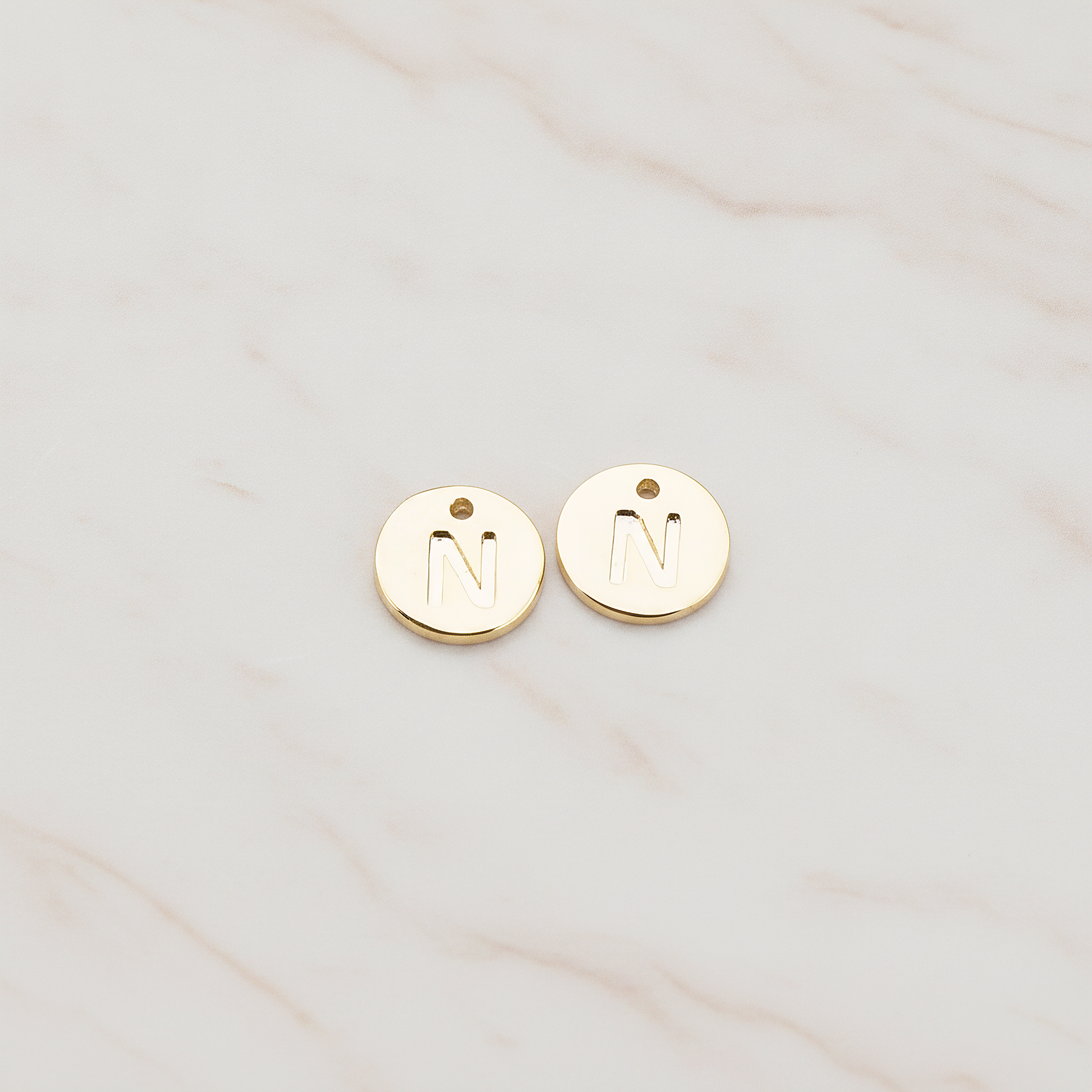Round Disk Initial Pendant, 2 Pc on warm marble background (PD.219)
