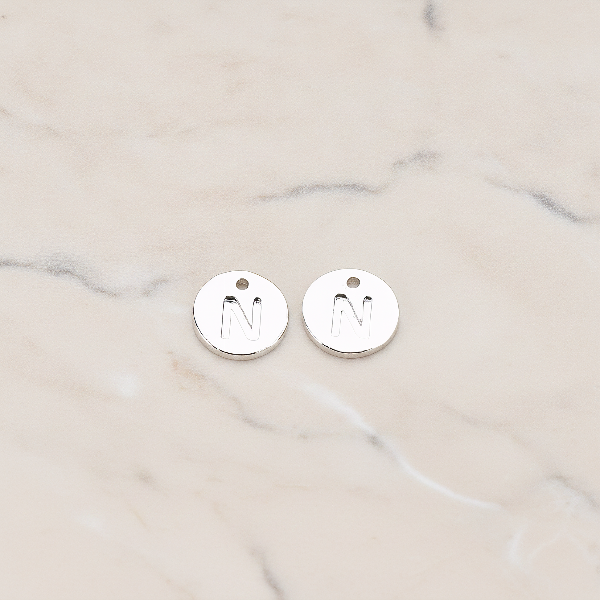 Round Disk Initial Pendant, 2 Pc on warm marble background (PD.219)