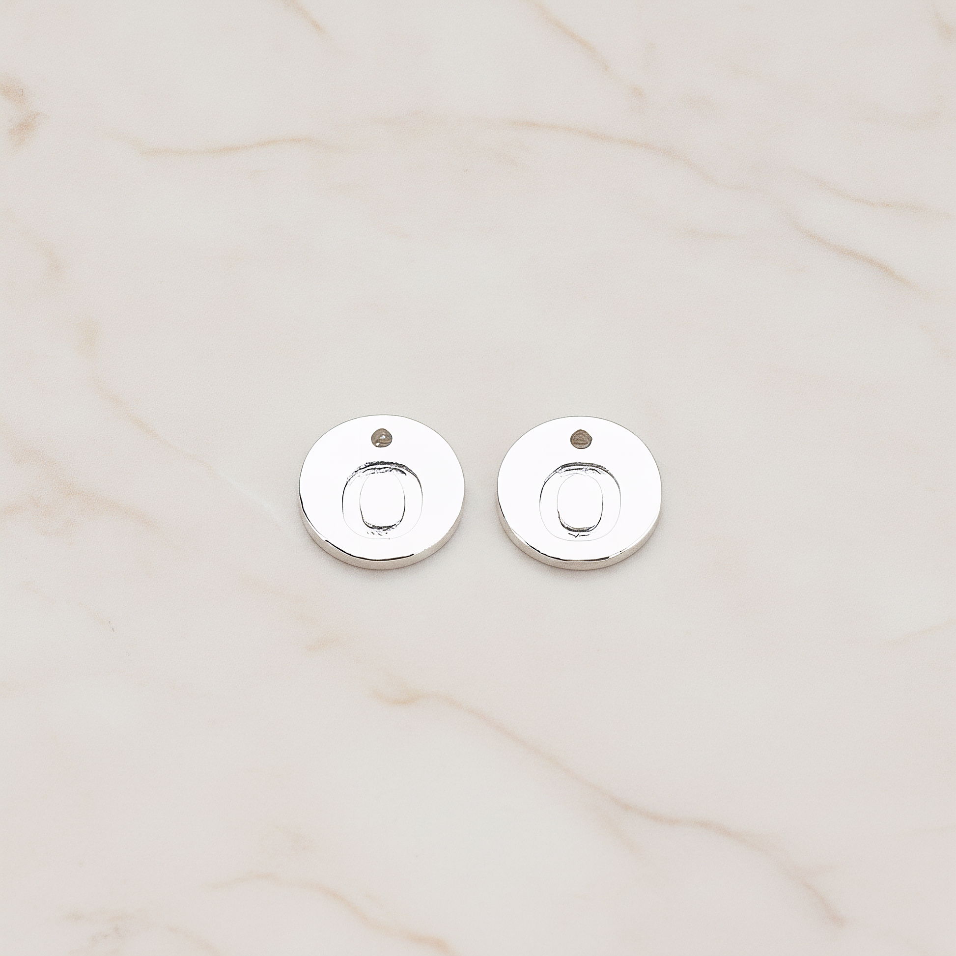 Round Disk Initial Pendant, 2 Pc on warm marble background (PD.219)