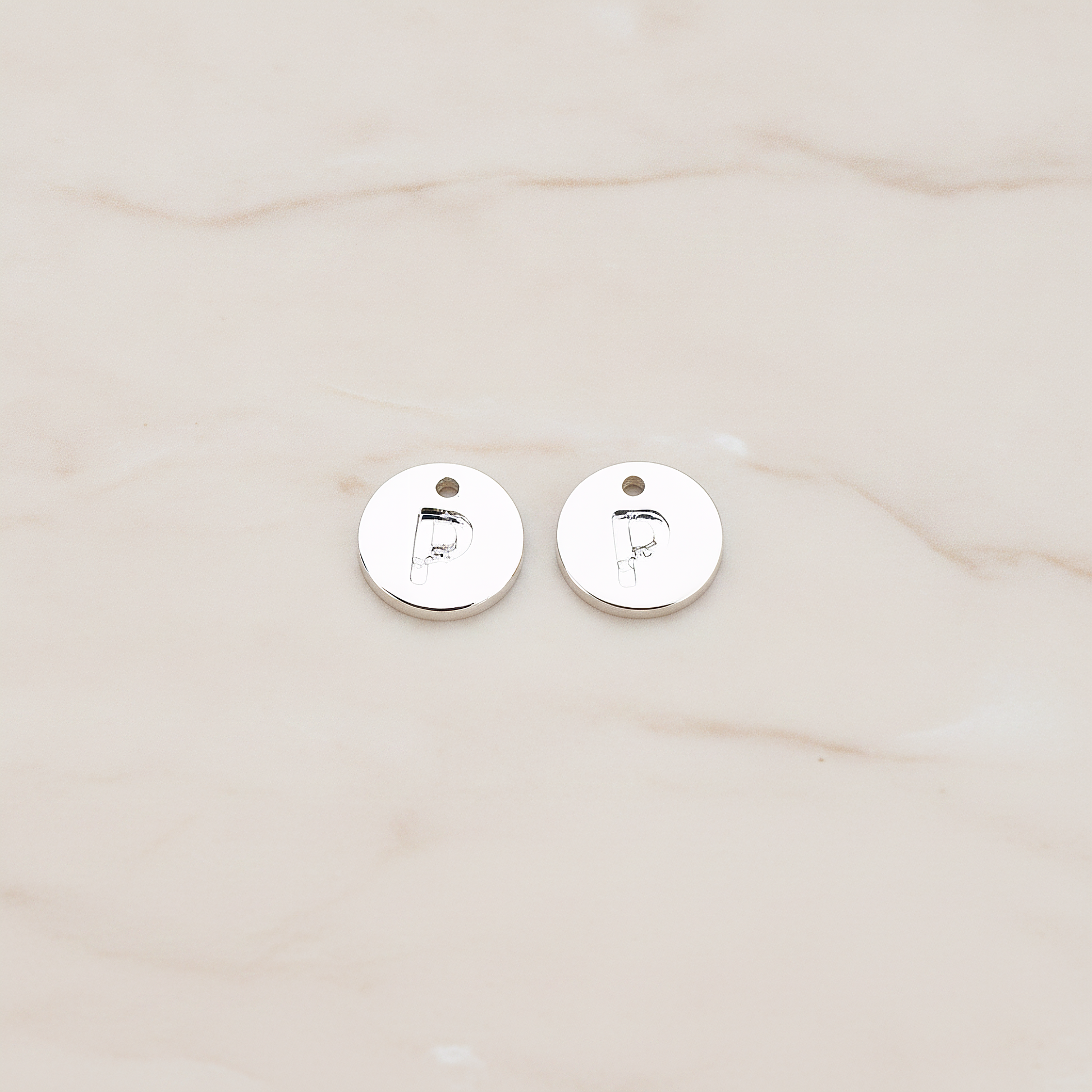 Round Disk Initial Pendant, 2 Pc on warm marble background (PD.219)