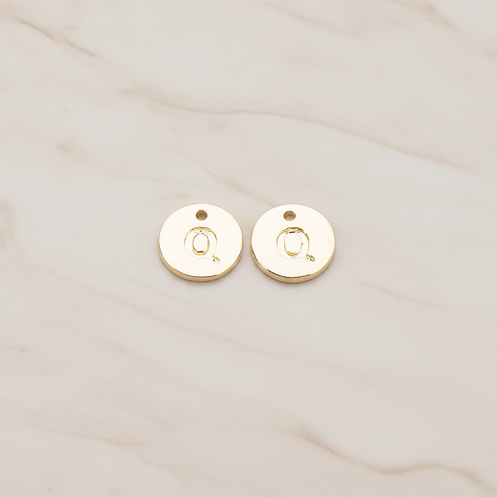 Round Disk Initial Pendant, 2 Pc on warm marble background (PD.219)