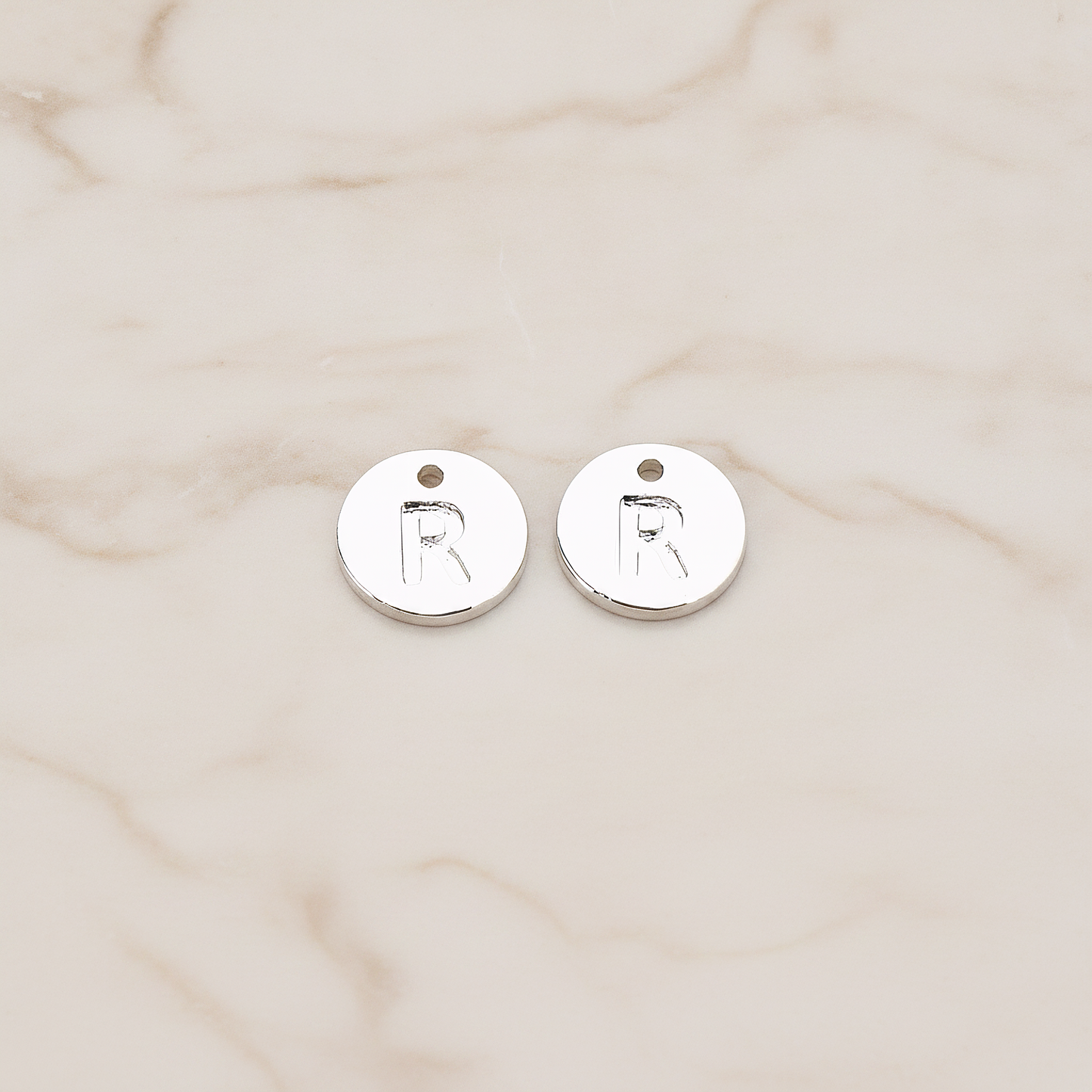Round Disk Initial Pendant, 2 Pc on warm marble background (PD.219)