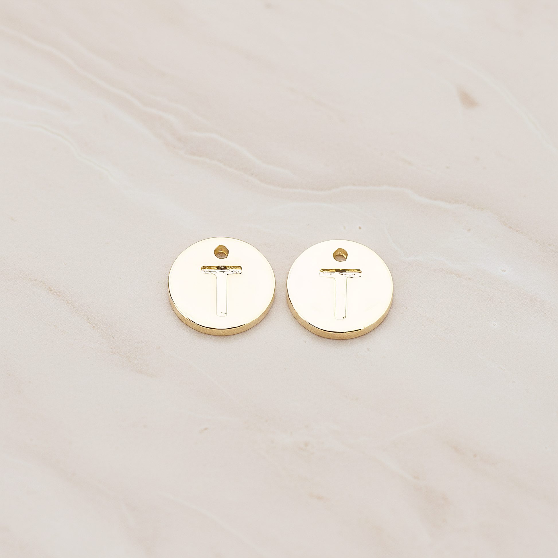 Round Disk Initial Pendant, 2 Pc on warm marble background (PD.219)